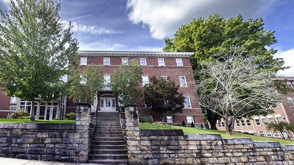 Wide-angle shot of Derriana Hall on a sunny day