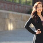 optometry scholar student maddie smith standing outside of the health professions education building