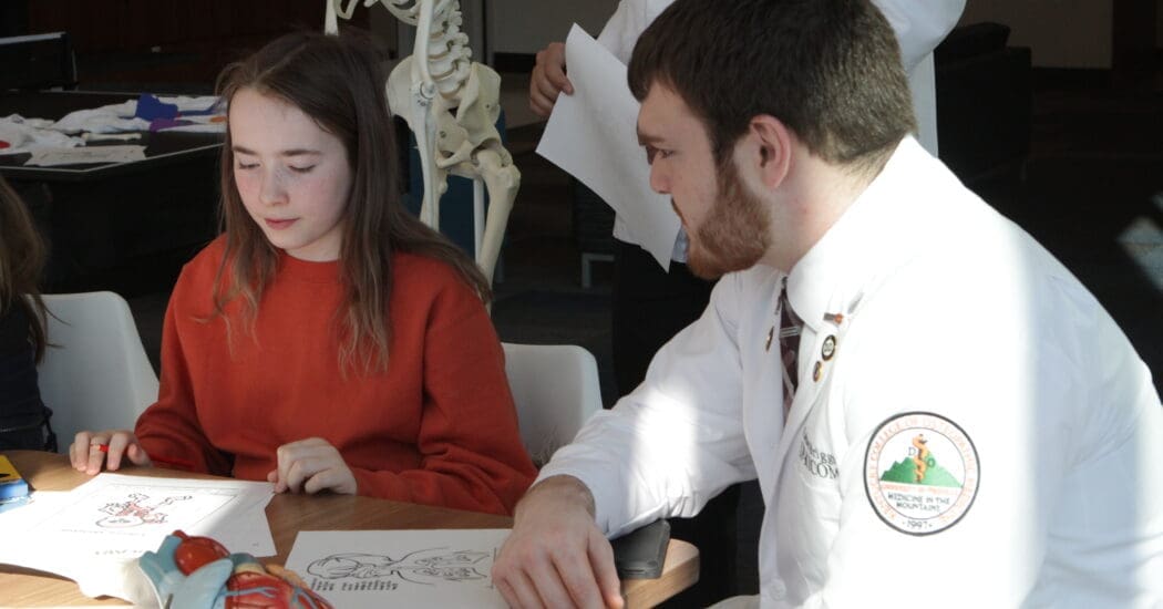 kycom student with grad school student during mini med school