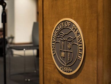 Podium with UPIKE's seal