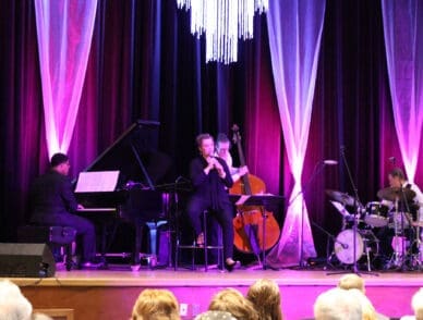 Singer performing in Booth Auditorium.