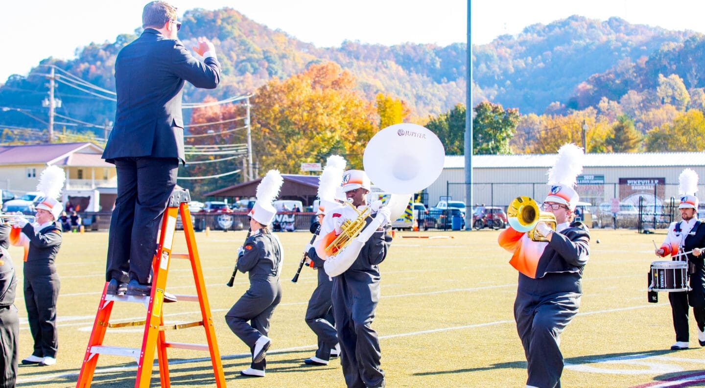 marching band performs at half time