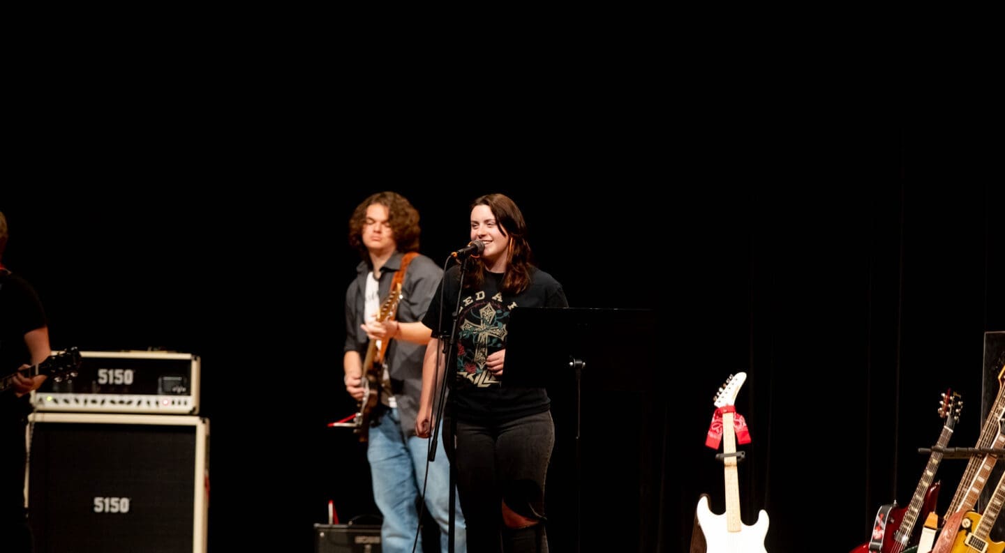 rock band ensemble perform on campus