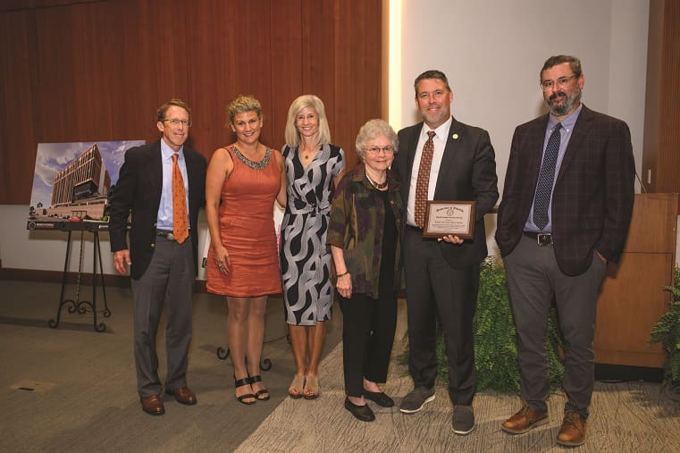 Group photo of President Webb with the Tanner Family of the Tanner School of Dental Medicine
