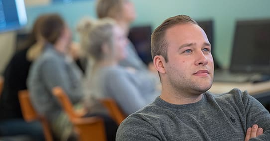 RNBSN student in computer lab.