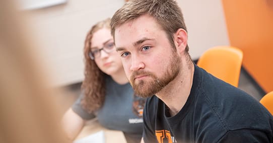 Student listening in a social work class.