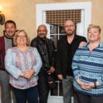 A group of alumni are photographed together during an alumni event in florida