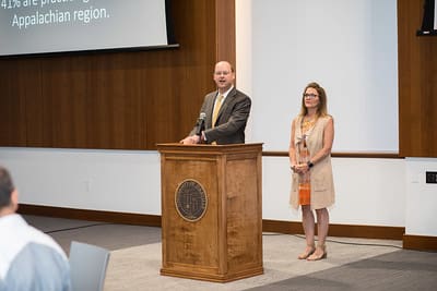 VP for Advancement David Hutchens introduces Theresa Dawahare to deliver prayer