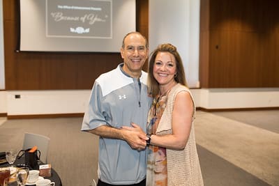 UPIKE professor Theresa Dawahare and spouse