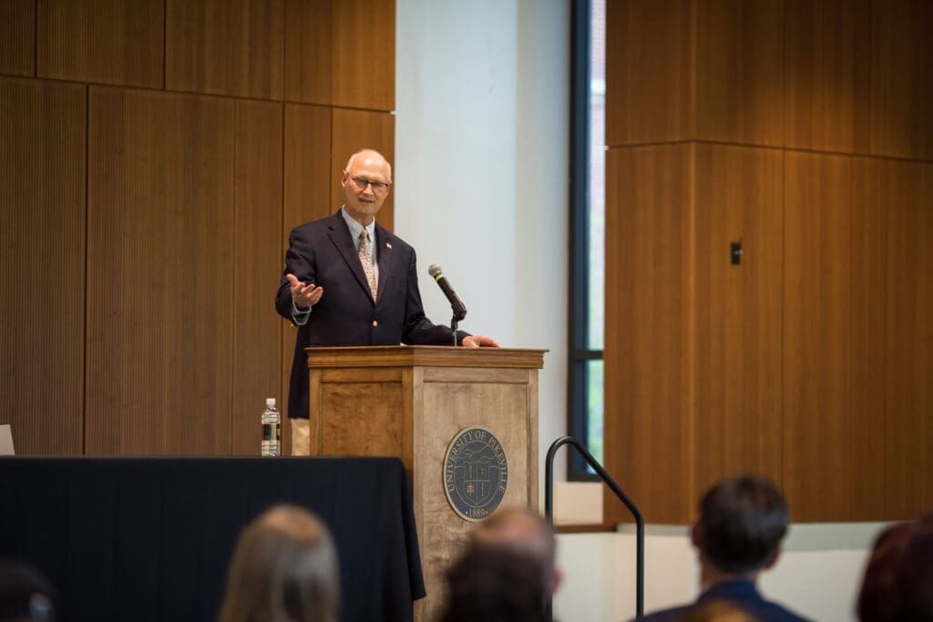Speaker Rick Bartley speaking to students