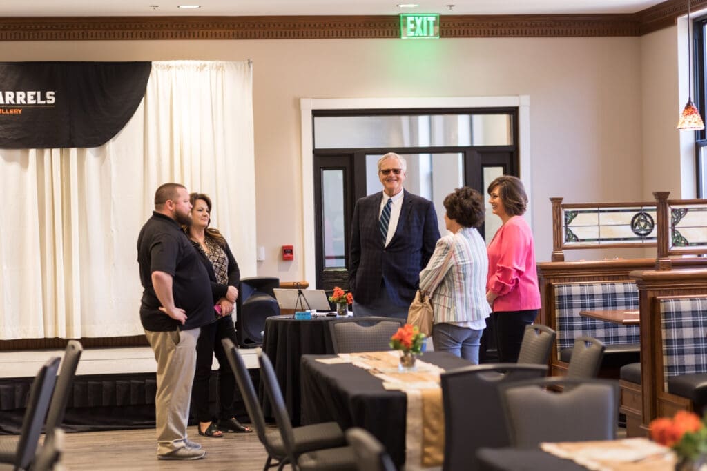 Guests being welcomed to the event