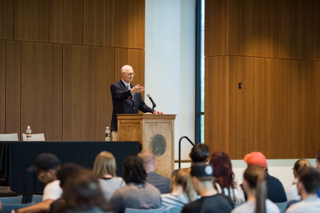 Rick Bartley speaking to students at event