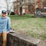 Jones outside of the coleman college of business on UPIKE's campus