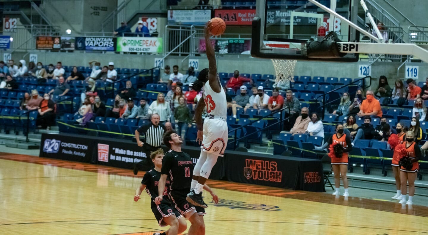 basketball player dunking