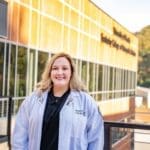 KYCOM Student Hannah Skaggs pictured by the Coal Building